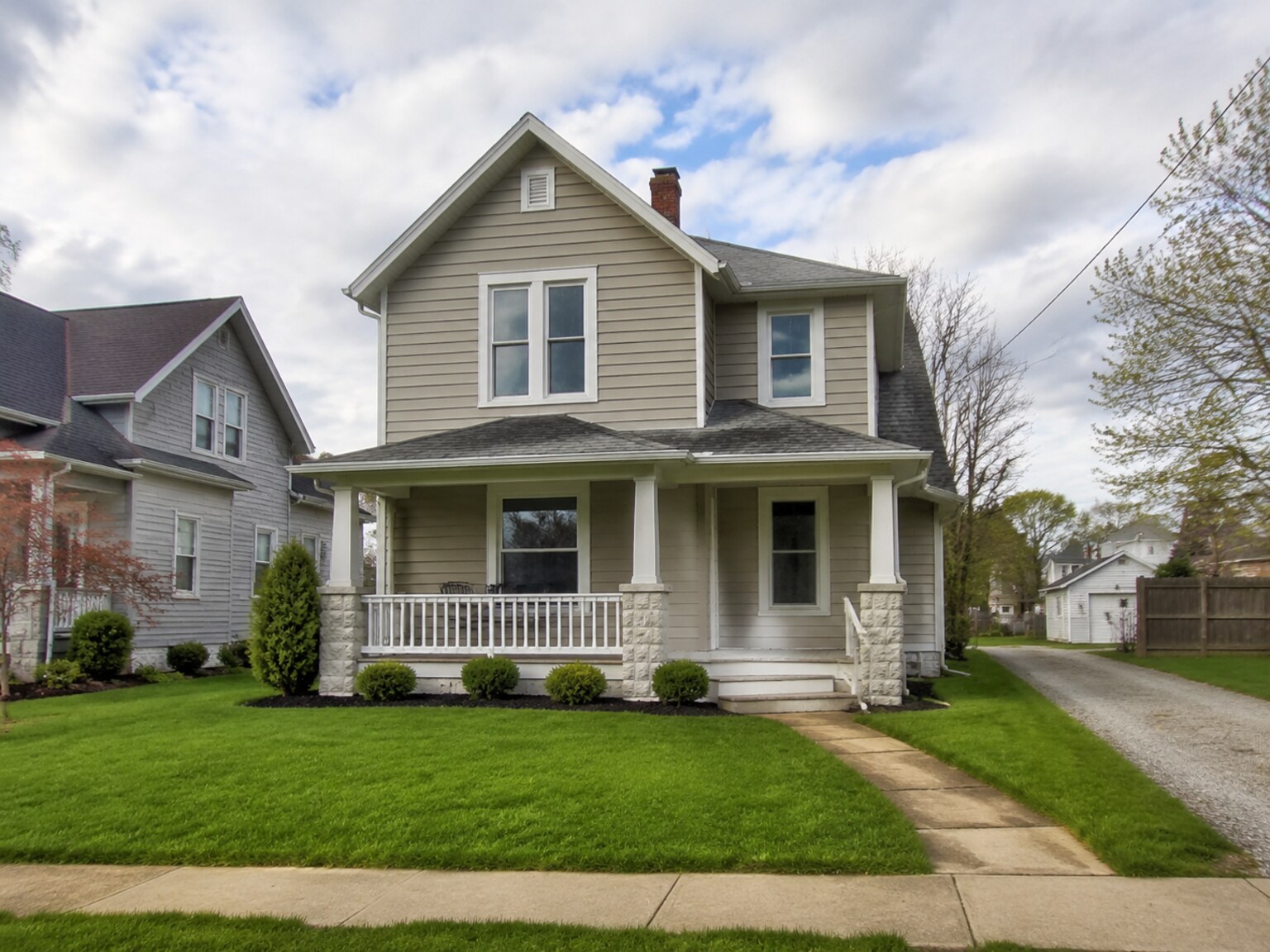 Clean professional exterior image representing 1132 North Water Street in Uhrichsville, Ohio
